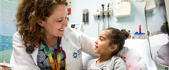 Pediatric Physician with Child