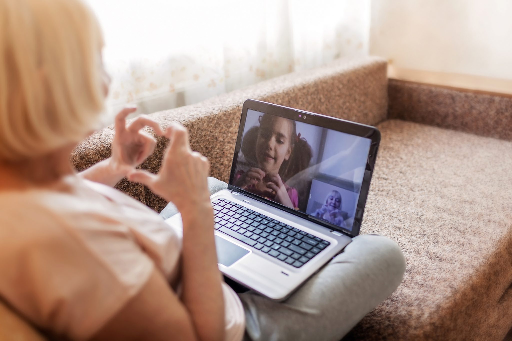 Woman Facetiming with Child 