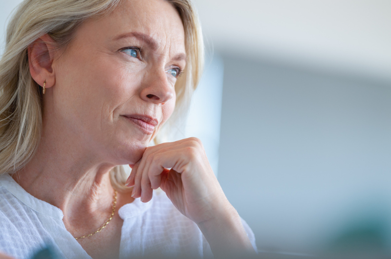 A platter of round, golden-colored turmeric protein bites.