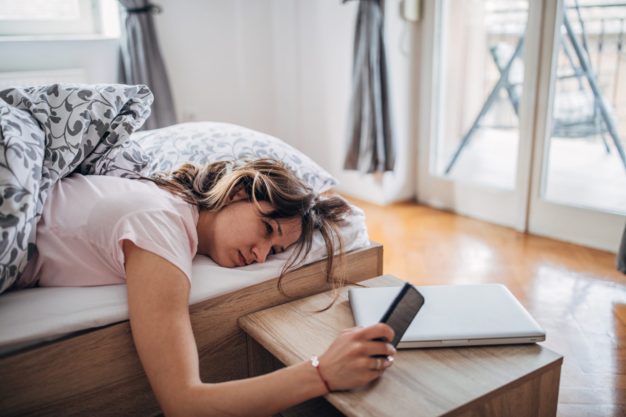 young woman in bed