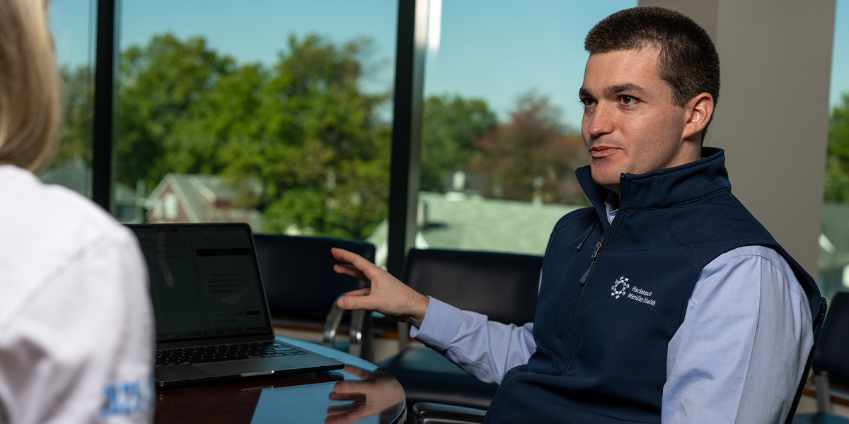 Doctor seated at desk
