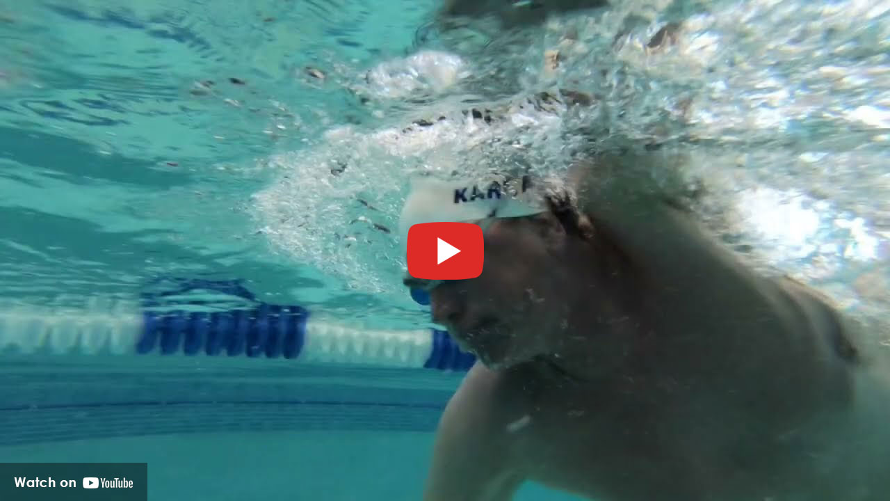 Swimmer underwater in pool
